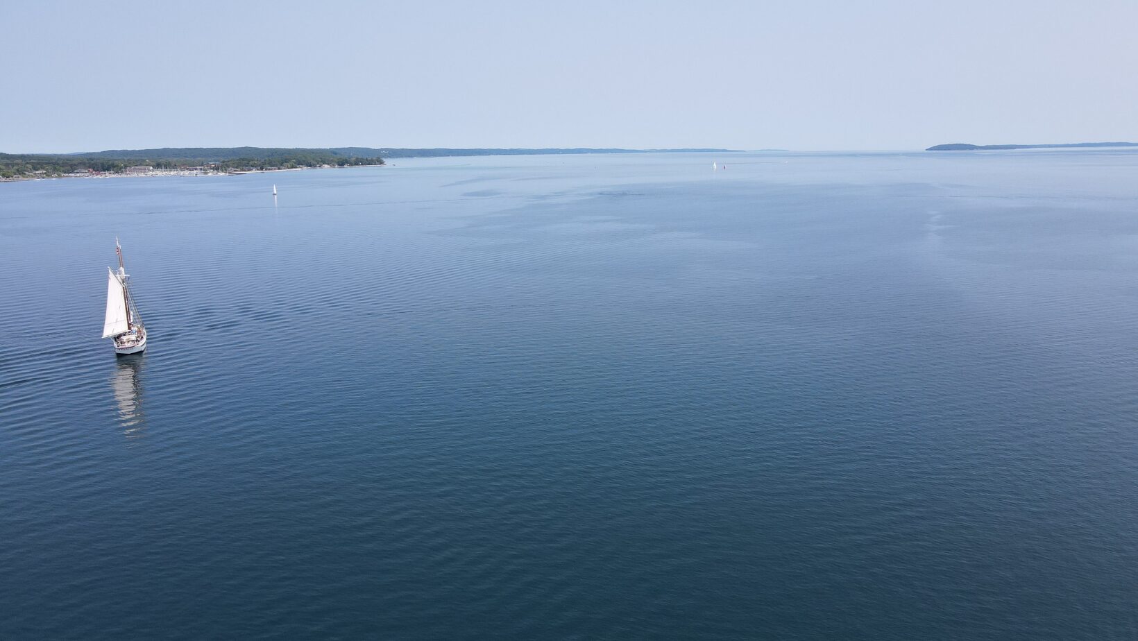 Explore Grand Traverse Bay! Enjoy beaches, boating, wineries, lighthouses, and more in this stunning Great Lakes destination.